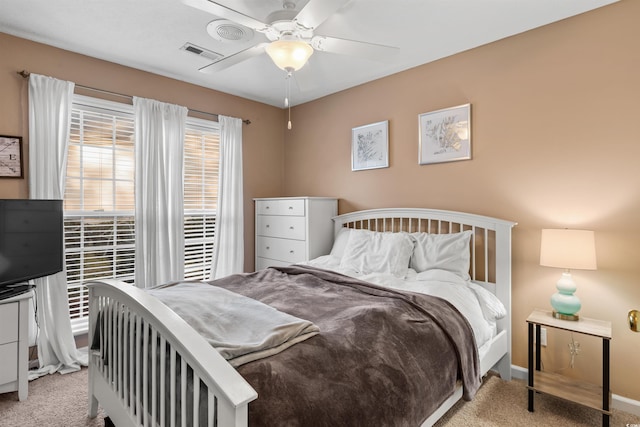 bedroom featuring ceiling fan and light colored carpet