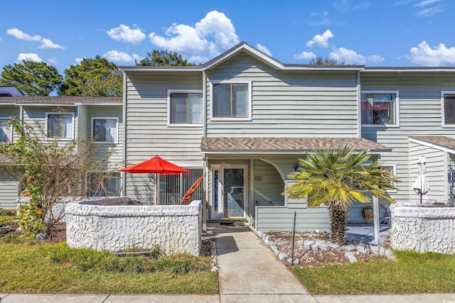 86 Shadow Moss Pl Unit 86, North Myrtle Beach, SC 29582 - view of front facade featuring a shingled roof