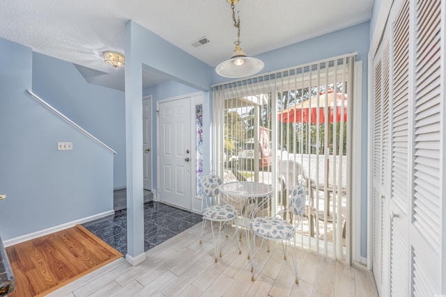 86 Shadow Moss Pl Unit 86, North Myrtle Beach, SC 29582 - foyer entrance featuring wood finished floors and baseboards