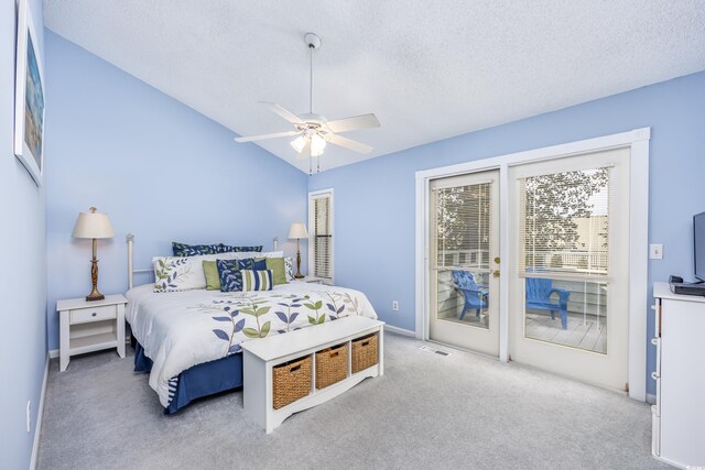 86 Shadow Moss Pl Unit 86, North Myrtle Beach, SC 29582 - bedroom featuring access to outside, carpet flooring, a textured ceiling, vaulted ceiling, and ceiling fan