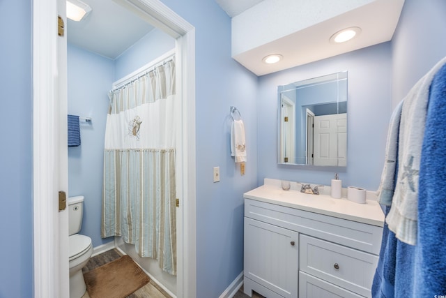 86 Shadow Moss Pl Unit 86, North Myrtle Beach, SC 29582 - full bathroom with vanity, toilet, baseboards, and wood finished floors