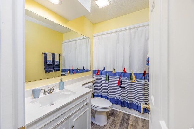 86 Shadow Moss Pl Unit 86, North Myrtle Beach, SC 29582 - bathroom featuring vanity, toilet, wood finished floors, and curtained shower