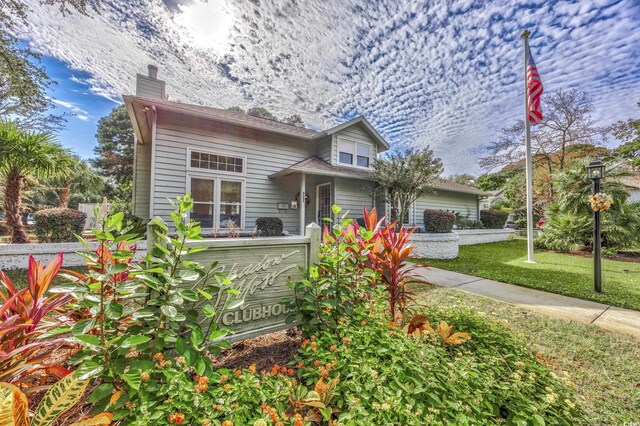 86 Shadow Moss Pl Unit 86, North Myrtle Beach, SC 29582 - bungalow-style house featuring a chimney