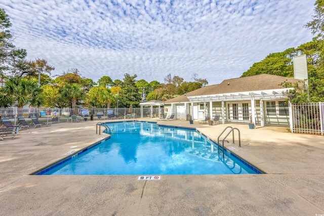 86 Shadow Moss Pl Unit 86, North Myrtle Beach, SC 29582 - community pool featuring a pergola, a patio area, and french doors