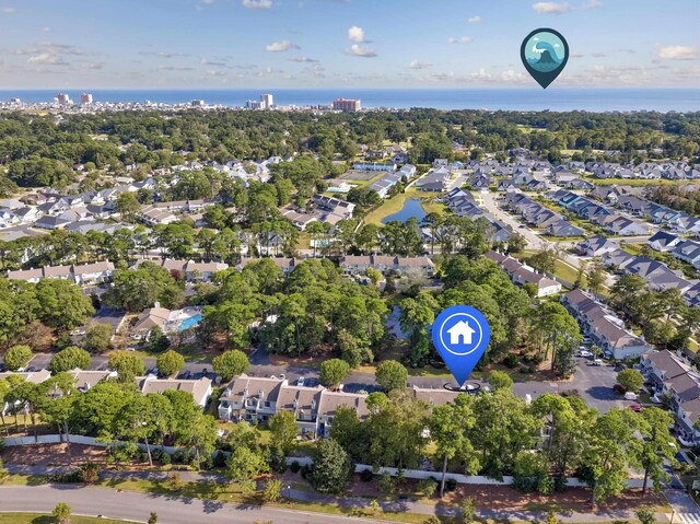 86 Shadow Moss Pl Unit 86, North Myrtle Beach, SC 29582 - aerial overview of property's location featuring a nearby body of water, nearby suburban area, and a tree filled landscape