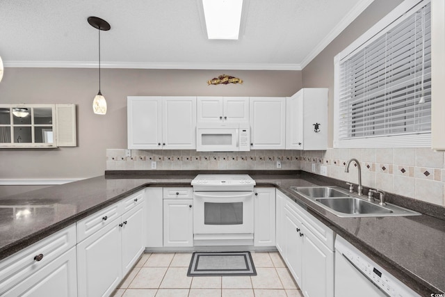 kitchen with white cabinetry, white appliances, ornamental molding, and hanging light fixtures