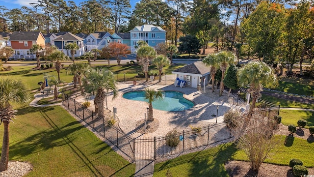 view of swimming pool with a lawn and a patio