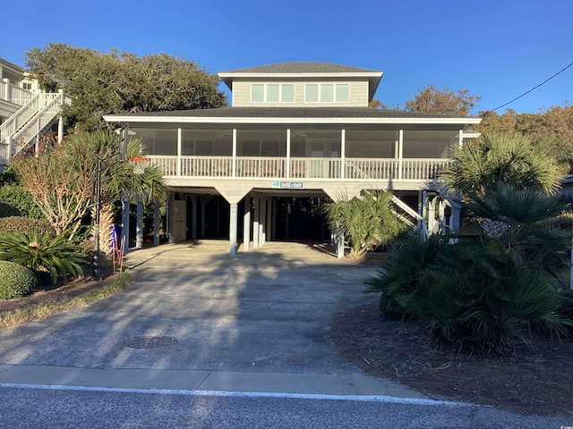 view of front of home with a carport