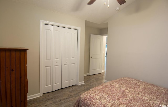 bedroom featuring a closet, dark wood-type flooring, and ceiling fan