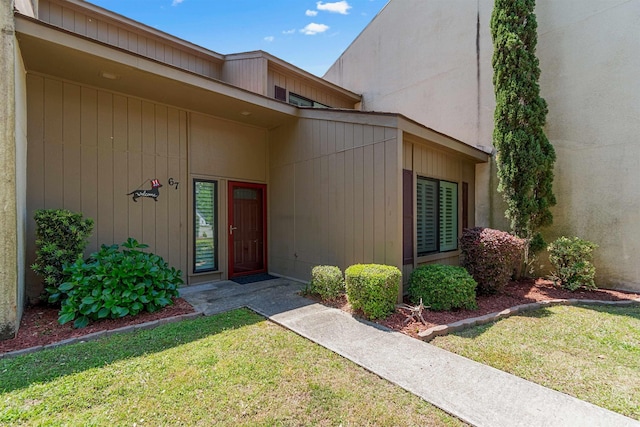 1100 Wedge Way Unit 67, Little River, SC 29566 - view of exterior entry with a yard