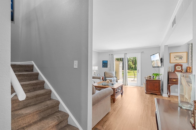 1100 Wedge Way Unit 67, Little River, SC 29566 - living room with light wood-style floors, stairs, and baseboards