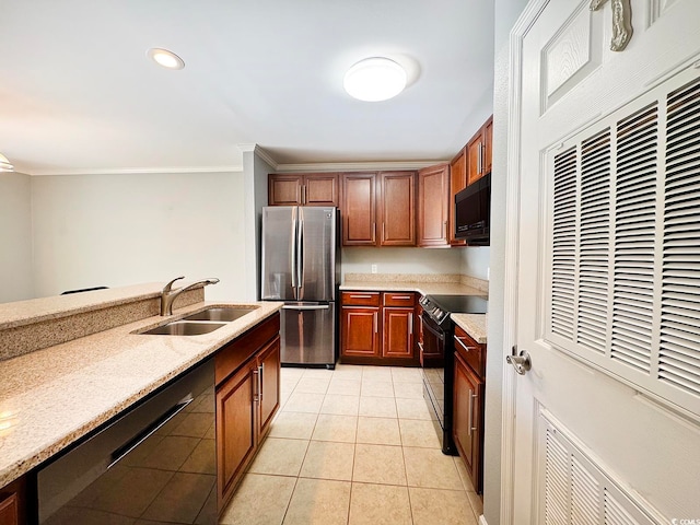 kitchen featuring light stone countertops, crown molding, sink, black appliances, and light tile patterned floors