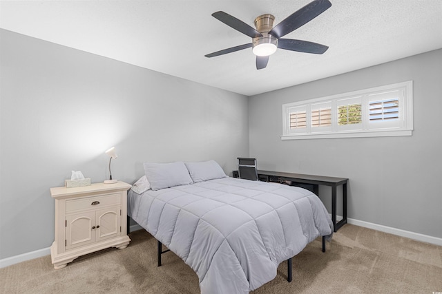 1100 Wedge Way Unit 67, Little River, SC 29566 - bedroom with light colored carpet, baseboards, and a ceiling fan