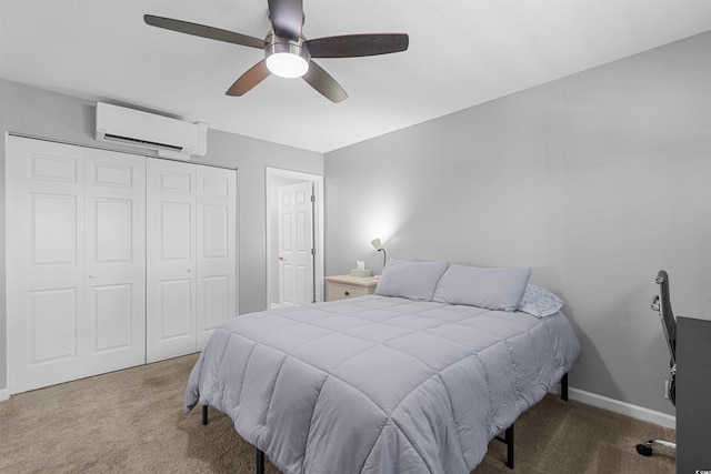 1100 Wedge Way Unit 67, Little River, SC 29566 - bedroom with an AC wall unit, carpet floors, a closet, and a ceiling fan