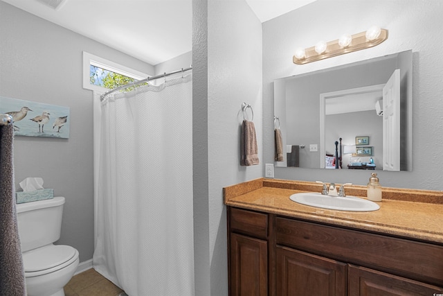 1100 Wedge Way Unit 67, Little River, SC 29566 - bathroom featuring vanity, toilet, tile patterned flooring, and curtained shower