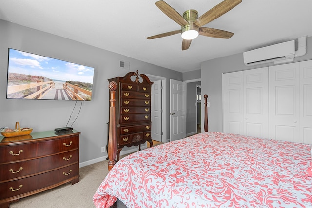 1100 Wedge Way Unit 67, Little River, SC 29566 - carpeted bedroom with a wall mounted air conditioner, a closet, baseboards, and a ceiling fan