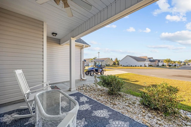 view of patio featuring ceiling fan