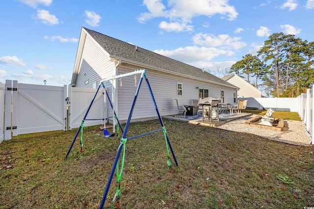 rear view of house with a patio area