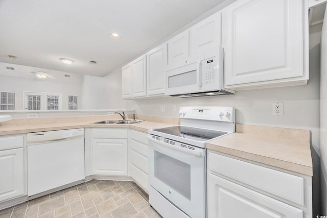 kitchen with white cabinets, white appliances, ceiling fan, and sink