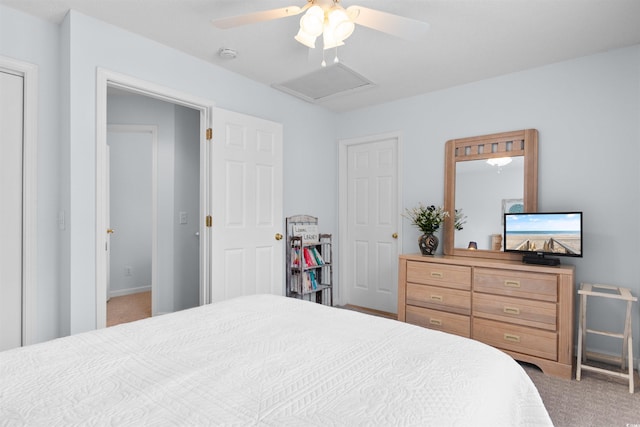 carpeted bedroom with ceiling fan