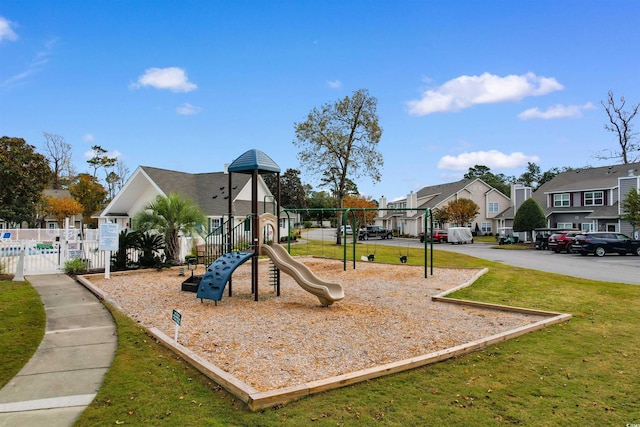 view of playground featuring a yard