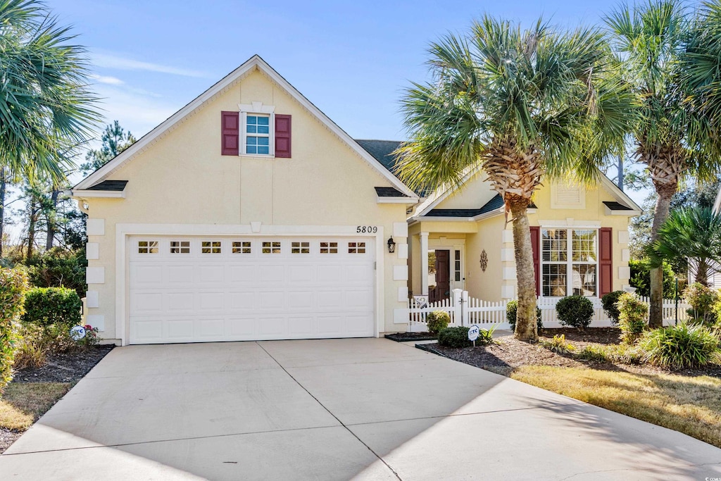 view of front of property with a garage