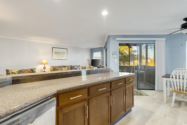 kitchen featuring light stone countertops, ceiling fan, dishwasher, light hardwood / wood-style flooring, and ornamental molding