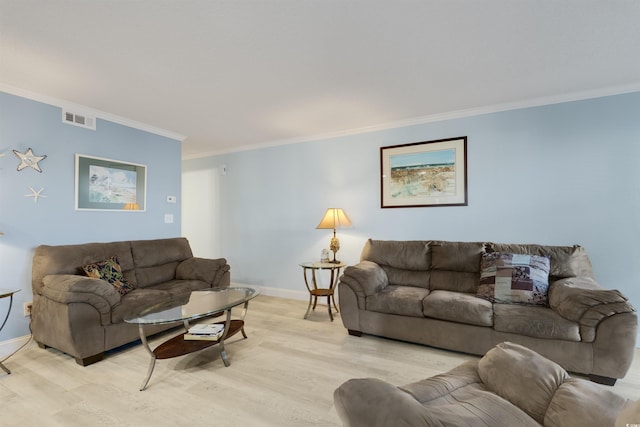 living room featuring light hardwood / wood-style floors and ornamental molding