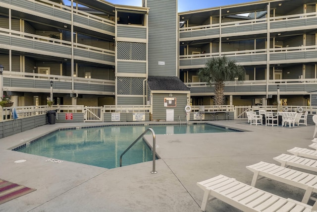 view of pool featuring a patio