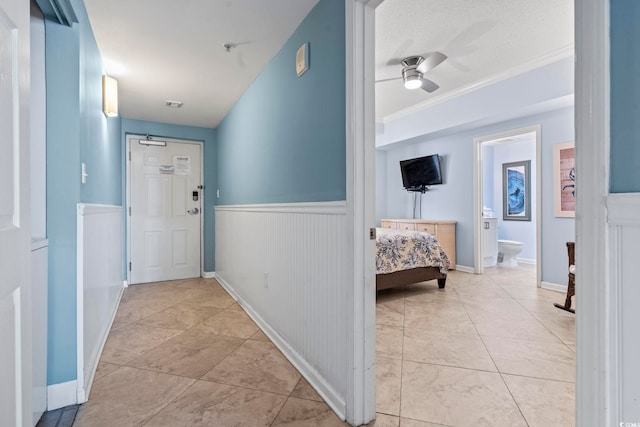 corridor with crown molding