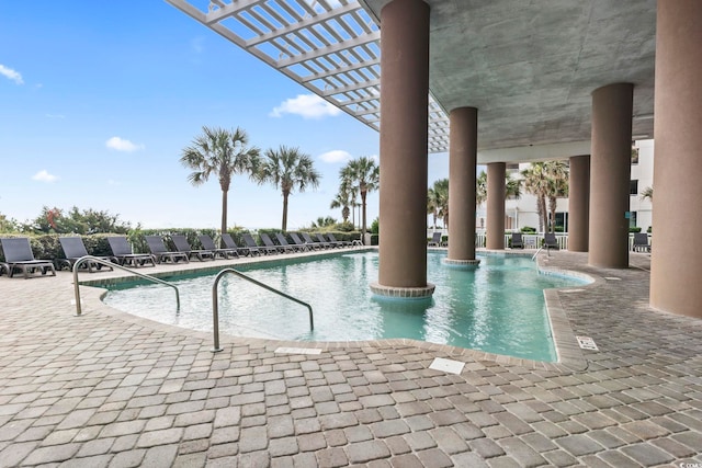 view of pool featuring a patio area