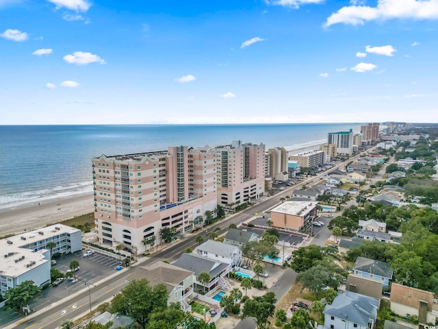 bird's eye view with a view of the beach and a water view