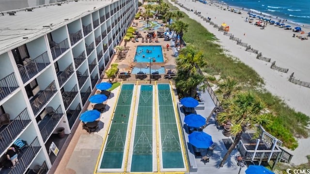 bird's eye view with a beach view and a water view