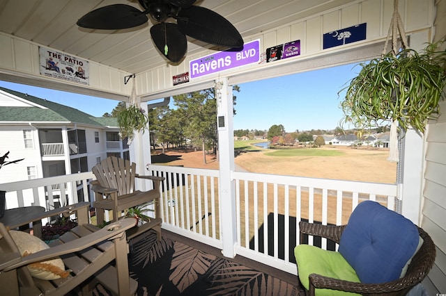 wooden deck with ceiling fan