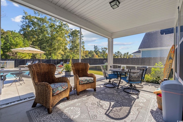 view of patio / terrace featuring a fenced in pool