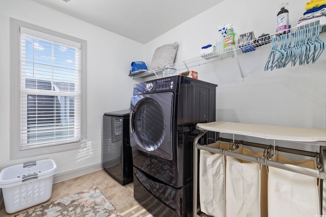 washroom featuring independent washer and dryer