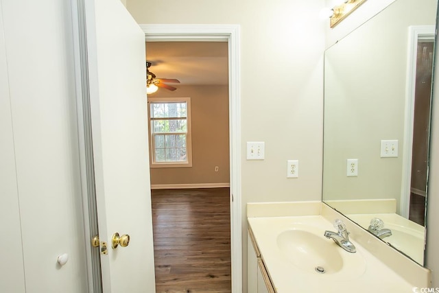 bathroom featuring vanity and hardwood / wood-style flooring