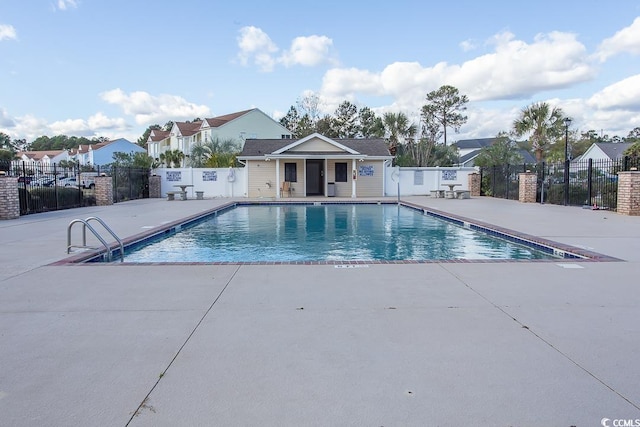 view of swimming pool featuring a patio