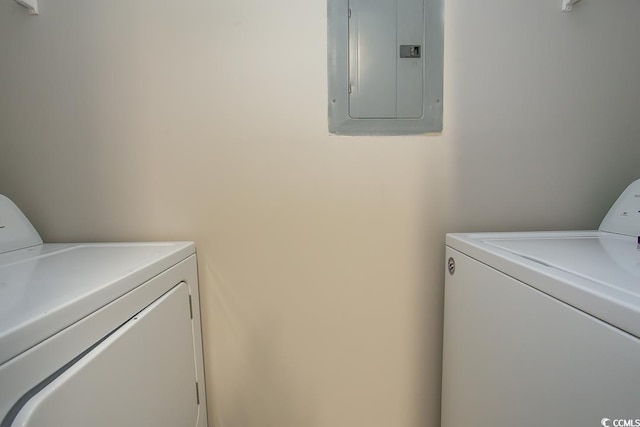 laundry area featuring separate washer and dryer and electric panel