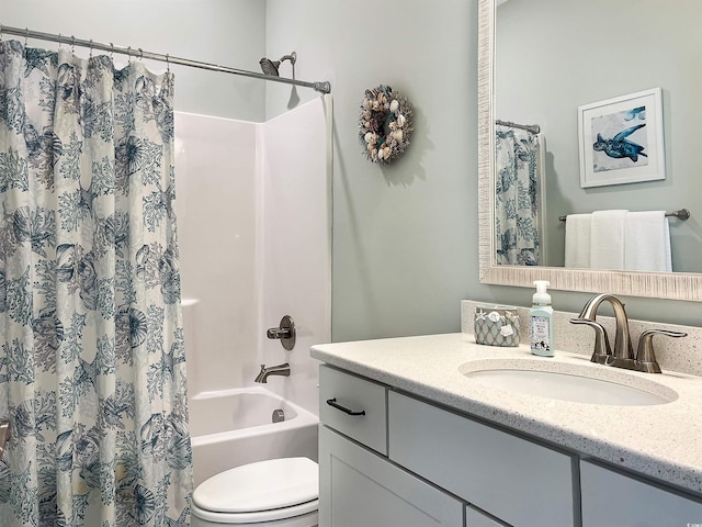 full bathroom with shower / bathtub combination with curtain, vanity, and toilet