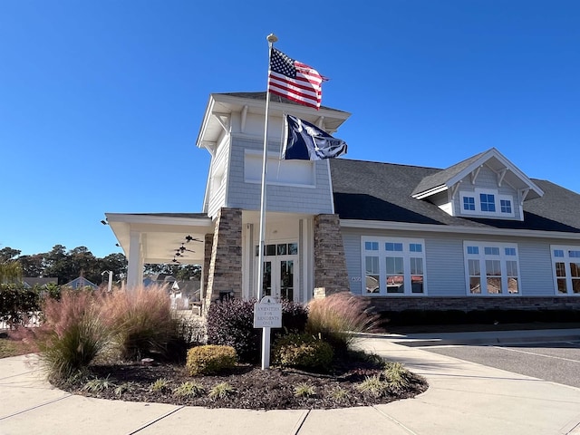 view of front of property featuring stone siding