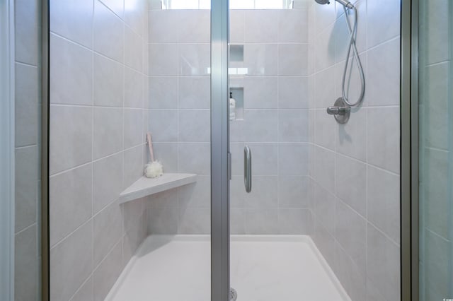 bathroom with an enclosed shower