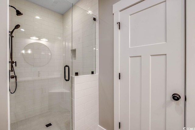 bathroom featuring an enclosed shower