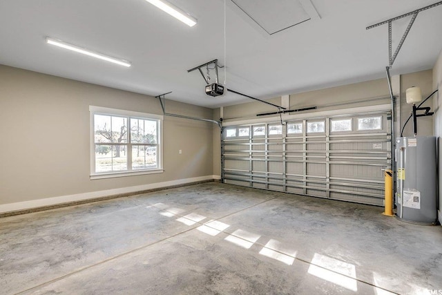 garage featuring water heater and a garage door opener