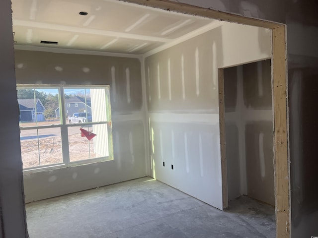 spare room featuring a wealth of natural light