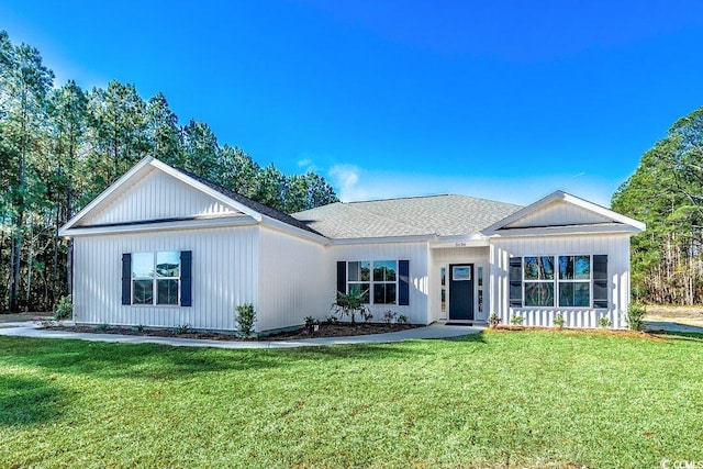 view of front of property with a front lawn