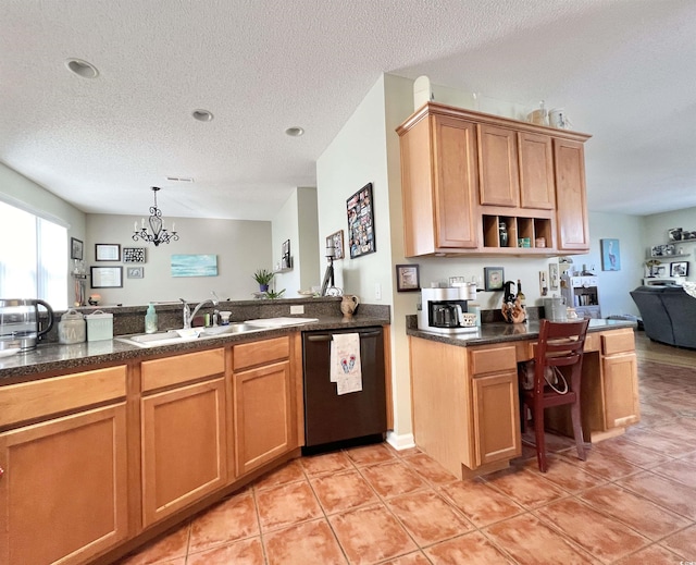 kitchen featuring a textured ceiling, stainless steel dishwasher, a notable chandelier, and sink