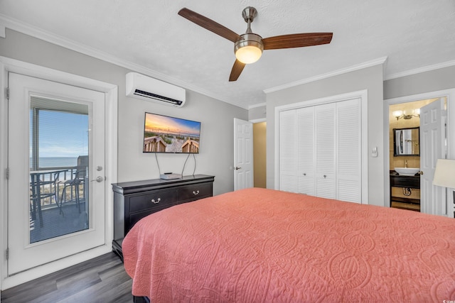 bedroom featuring ornamental molding, a wall mounted air conditioner, access to exterior, and dark hardwood / wood-style flooring