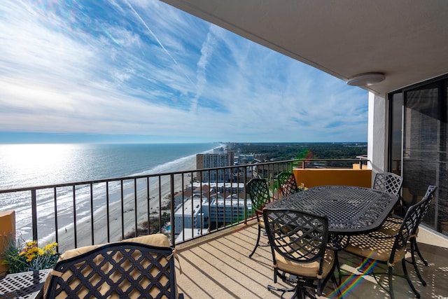 balcony featuring a water view