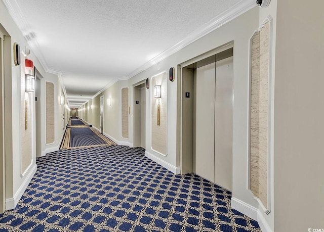 hallway featuring elevator, crown molding, and a textured ceiling